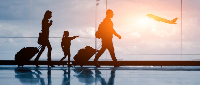 Banner Image of a Family Walking Through an Airport