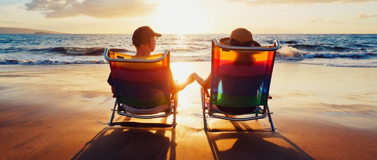 Banner image of couple watching sunset