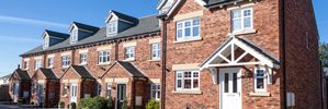 Banner Image of Detached Houses in UK Housing Development 
